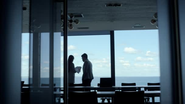 Business Team Silhouettes Discussing Ideas Beautiful Sea View Window Two — Stok video