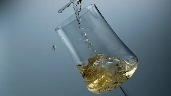 Beautiful Wine Pouring Glass Light Background Closeup White Fizzy Beverage — Stockfoto