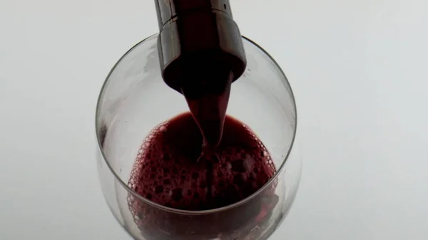 Bottle Filling Red Wine Goblet Closeup Cabernet Pouring Bubbling Wineglass — Foto de Stock