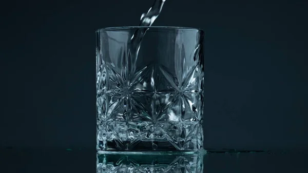 Pouring Water Crystal Glass Dark Background Closeup Liquid Stream Falling — Fotografia de Stock