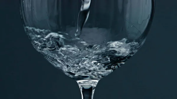 Closeup Pure Water Filling Wine Glass Air Bubbles Rising Cup — Fotografia de Stock