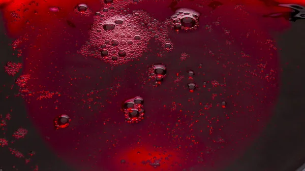 Κόκκινο Κρασί Αφρώδης Υφή Closeup Φουσκωμένη Υγρή Επιφάνεια Αφρού Κινείται — Φωτογραφία Αρχείου