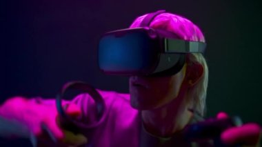 Augmented reality headset artist working on abstract 3D sculpture with controllers closeup. Active man using gestures to create multimedia internet concept art. NFT metaverse artwork concept