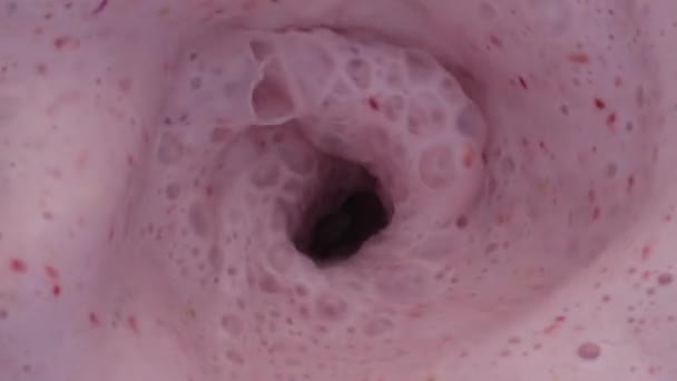 Top View Pink Berry Smoothie Surface Swirling Blender Bowl Close — Stock Video