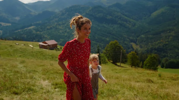 Happy Woman Showing Daughter Mountains Views Sunny Day Smiling Mother — Photo
