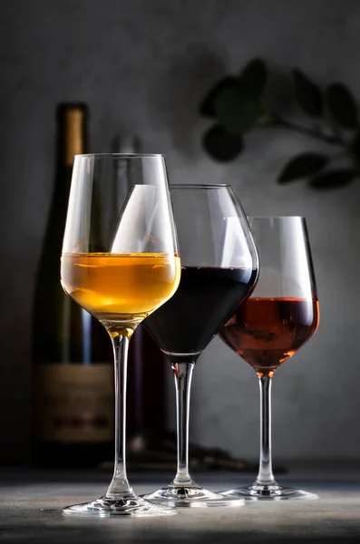 Wines Assortment Red White Rose Wine Glasses Bottles Gray Table — Foto Stock