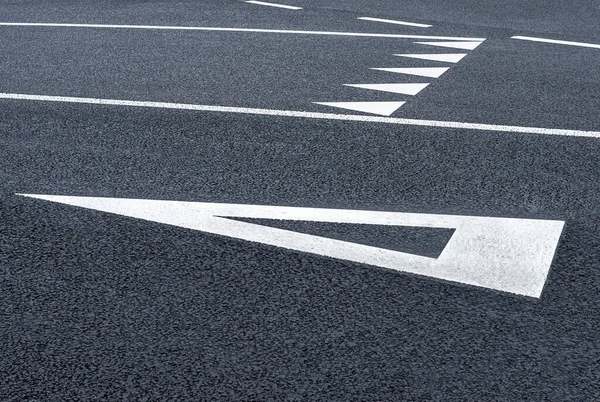 Give Way triangle road markings on the asphalt. Roads infrastructure and transpor