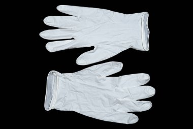 Medical gloves on a dark background close-up. Healthcare and medication