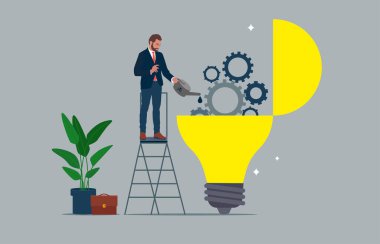 Businessman drop lubricant or grease into open lightbulb lamp with mechanical gears. Maintenance to generate idea or creativity and innovation.