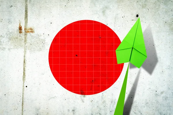 Upward arrow on the background of the flag of Japan. Paper plane. Economic recovery. Copy space.3D illustration. Business.