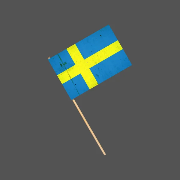 瑞典的国旗挂在手杖上。被灰色的背景隔离了设计元素。标志及符号. — 图库照片