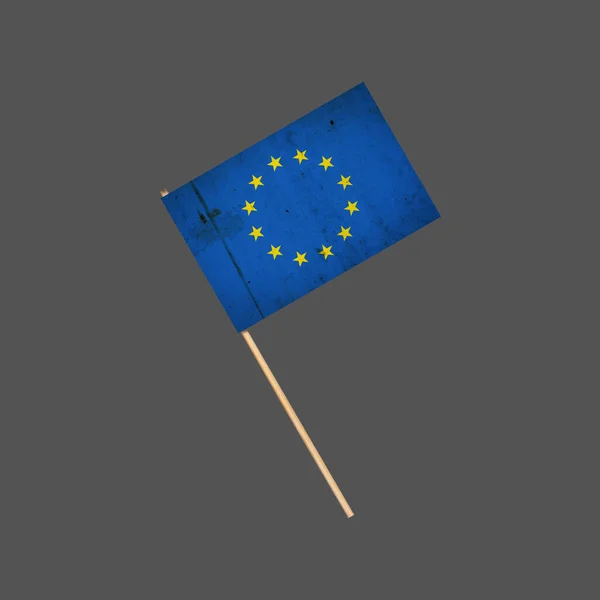 Flaga grunge Unii Europejskiej na patyku. Odizolowany na szarym tle. Element projektu. Znaki i symbole. — Zdjęcie stockowe
