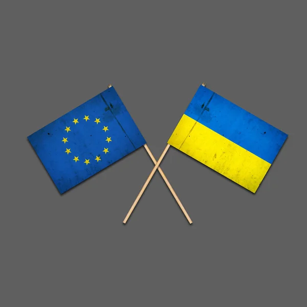 Vlajky Evropské Unie Ukrajiny Dřevěných Tyčích Izolovaný Šedém Pozadí Mezinárodní — Stock fotografie