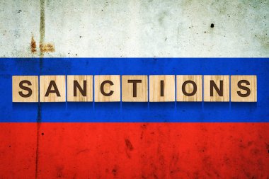 Yaptırımlar. Tahta bloklar hakkında söylentiler. Rusya bayrağının arka planına karşı. İş için. Siyaset. Ekonomi