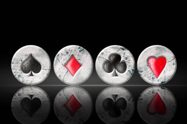 Vintage, grunge, stone poker chip, on a black background. Copy space. Reflection Poker Gambling