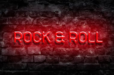 Rock and Roll. Red Neon tabelası eski tuğla bir duvarda. Müziği. Müzik stili. Müzik geçmişi. Arkaplan