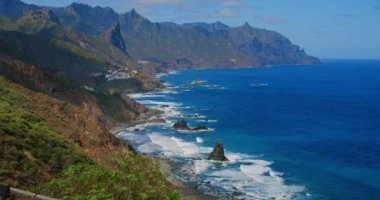 Rocky coast and Almaciga beach in Tenerife, The Canaries. Spain. Scenic view. Sunny and colourful day.