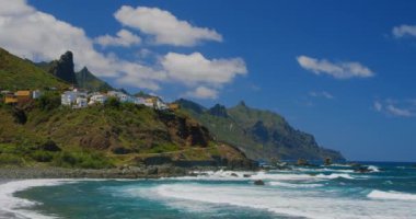 Rocky coast and Almaciga beach in Tenerife, The Canaries. Spain. Scenic view. Sunny and colourful day.
