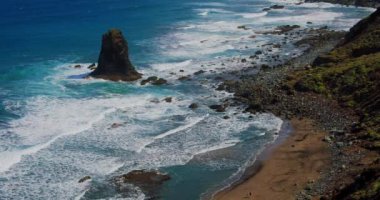 Rock formations and cliffs of North Coast of Tenerife, Canary Islands, Spain. Spectacular view. Tuoristic place. Slow motion.