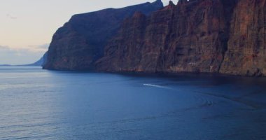 Los Gigantes cliffs. Sunset on Tenerife, Canary Islands, Spain. Volcanic rocky seaside resort in the Canary Islands. Nobody.