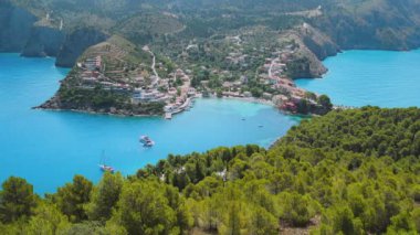 4k video of greek island Kefalonia. Aerial view of the Asos village from the Venetian Castle Ruins. Beautiful seascape of Ionian Sea. Summer vacation in Greece, Europe.