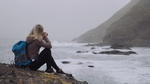 Tourist Female Admiring Powerful Waves Splashing Rocky Coastline Huge Volcanic — Stock video