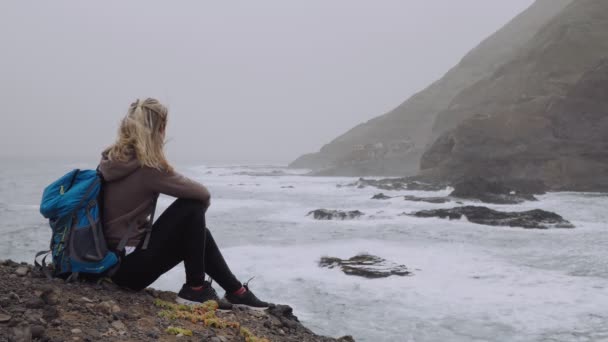 Tourist Female Admiring Powerful Waves Splashing Rocky Coastline Huge Volcanic — Stok video