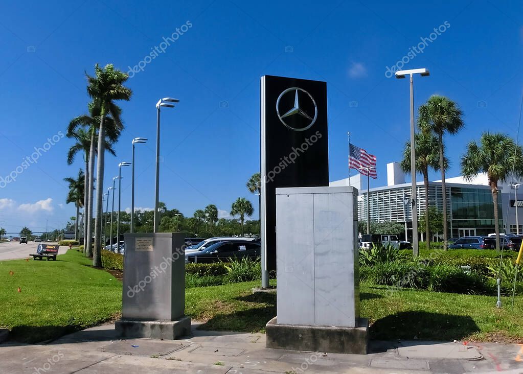 Fort Lauderdale, Florida, US - May 08, 2022: Mercedes Benz building car sign store dealership entrance shop logo