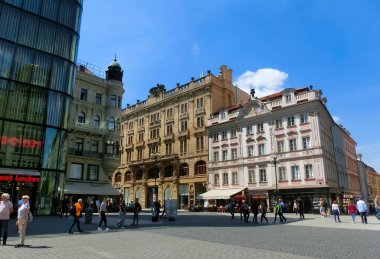 Prague, Czech Republic - May 11, 2022: People going near Wenceslas Square in inner city in Prague, Bohemia, Czech Republic
