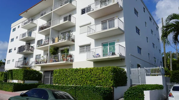 Modern apartment buildings with palm trees at Avenue at Miami, Usa