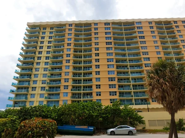 Modern apartment buildings with palm trees at beach at Miami, Usa