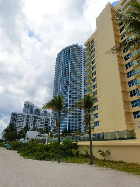 Modern apartment buildings with palm trees at beach at Miami, Usa