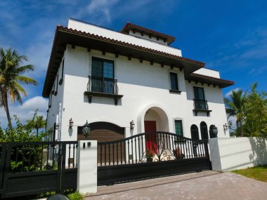 Lauderdale-By-The-Sea. Tipical apartment at beach in Florida on a beautiful sumer day. Tropical beach with palms at USA.