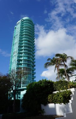 Modern apartment buildings with palm trees at Avenue at Miami, Usa