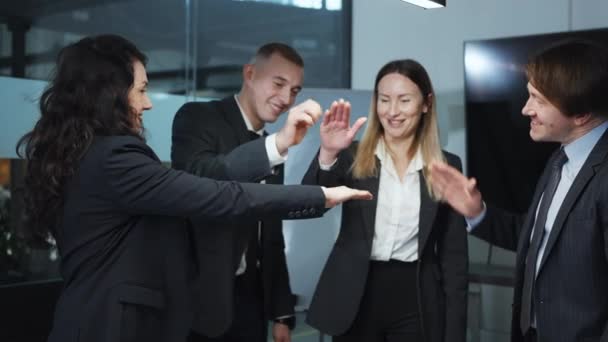 Business team putting hands together in stack — Stock Video