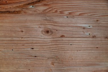 Eski ahşap arka plan, çizik ve çatlaklarla ahşap doku..