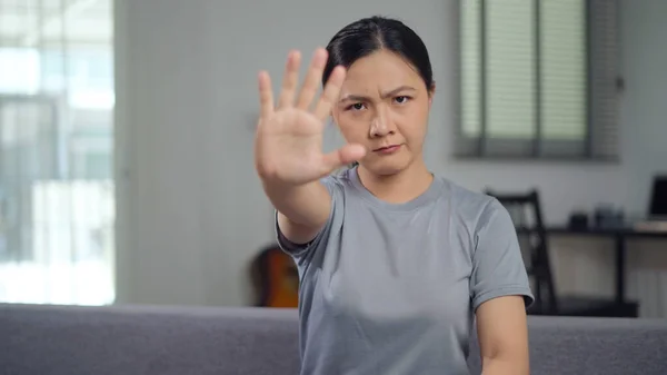 Asian Woman Showing Hand Making Stop Sign Sitting Sofa Living —  Fotos de Stock