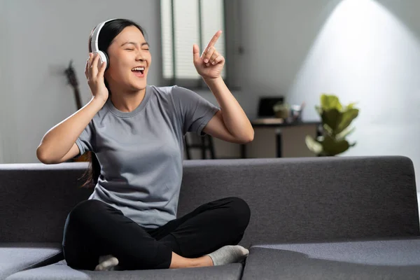 Happy Woman Headphones Listening Music Sitting Sofa Living Room Home — Foto de Stock