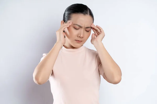 Asian Woman Sick Headache Touching Her Head Standing Isolated White — Stock Fotó