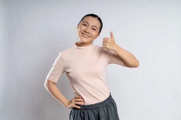 Asian Woman Happy Showing Thumb Looking Camera Standing Isolated White — Stockfoto