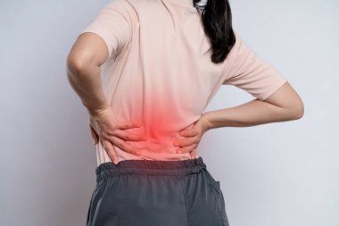 Asian woman was sick and pain touching her body with red spot , standing isolated on white background.