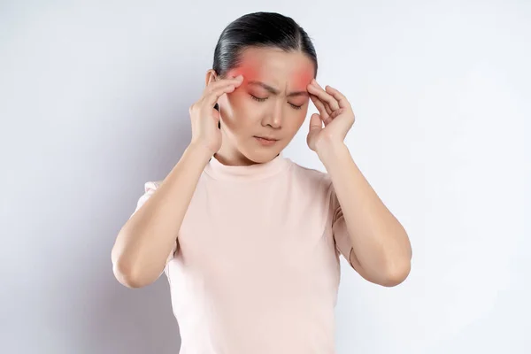 Asian Woman Sick Headache Touching Her Head Red Spot Standing lizenzfreie Stockfotos