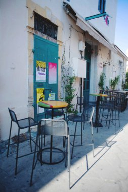Pub`s tables and chairs in most popular touristic street  in the center of Old Town. Limassol, Cyprus