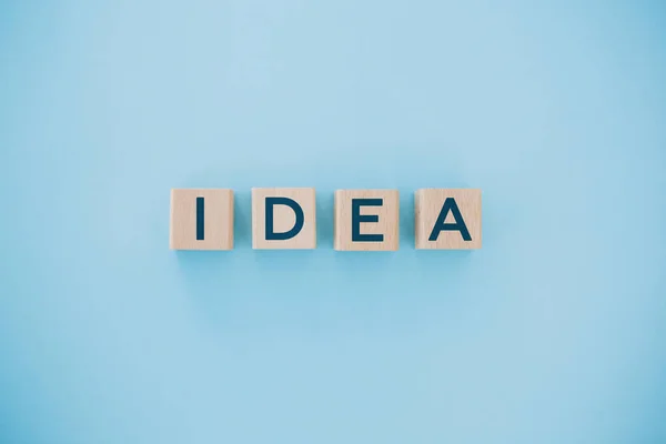 Concepto Idea Negocio Cubos Madera Con Idea Palabra Sobre Fondo — Foto de Stock