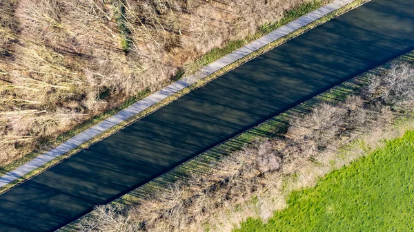 Canal Dessel Schoten aerial photo in Rijkevorsel, kempen, Belgium, showing the waterway in the natural green agricultural landscape. High quality photo — Stock Photo, Image