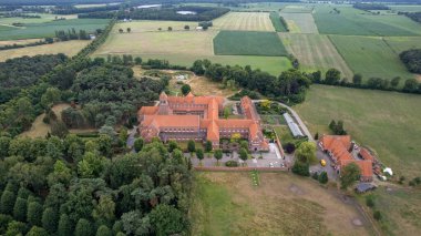 July 13th 2022, Brecht, Antwerp, Belgium: Aerial view of the monastery of nuns, or nunnery or abbey of Onze-Lieve-Vrouw van Nazareth, in Brecht. High quality photo