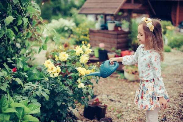 Cute Little Girl Wreath Flowers Her Head Watering Can Her — Stock Photo, Image