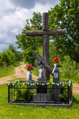 wooden cross in the foreground