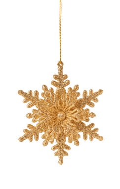 Beyaz arka planda izole edilmiş altın Noel kar tanesinin makro çekimi.