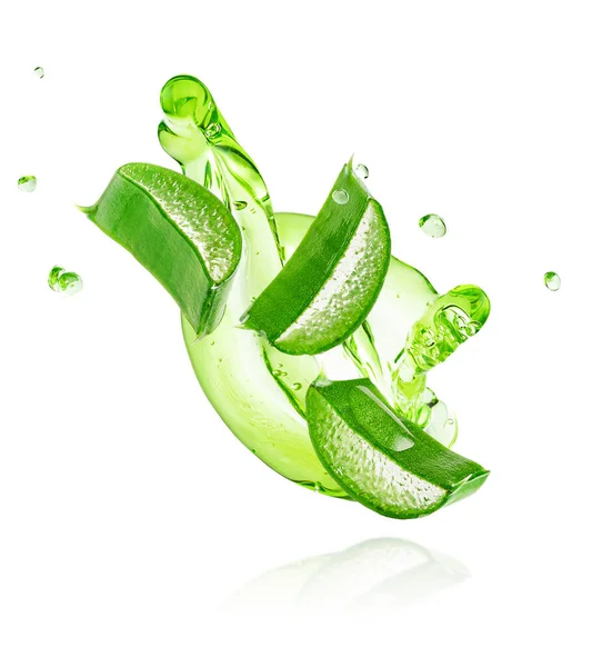 Green gel flowing with aloe vera slices isolated on white background with clipping path. — Stock Photo, Image